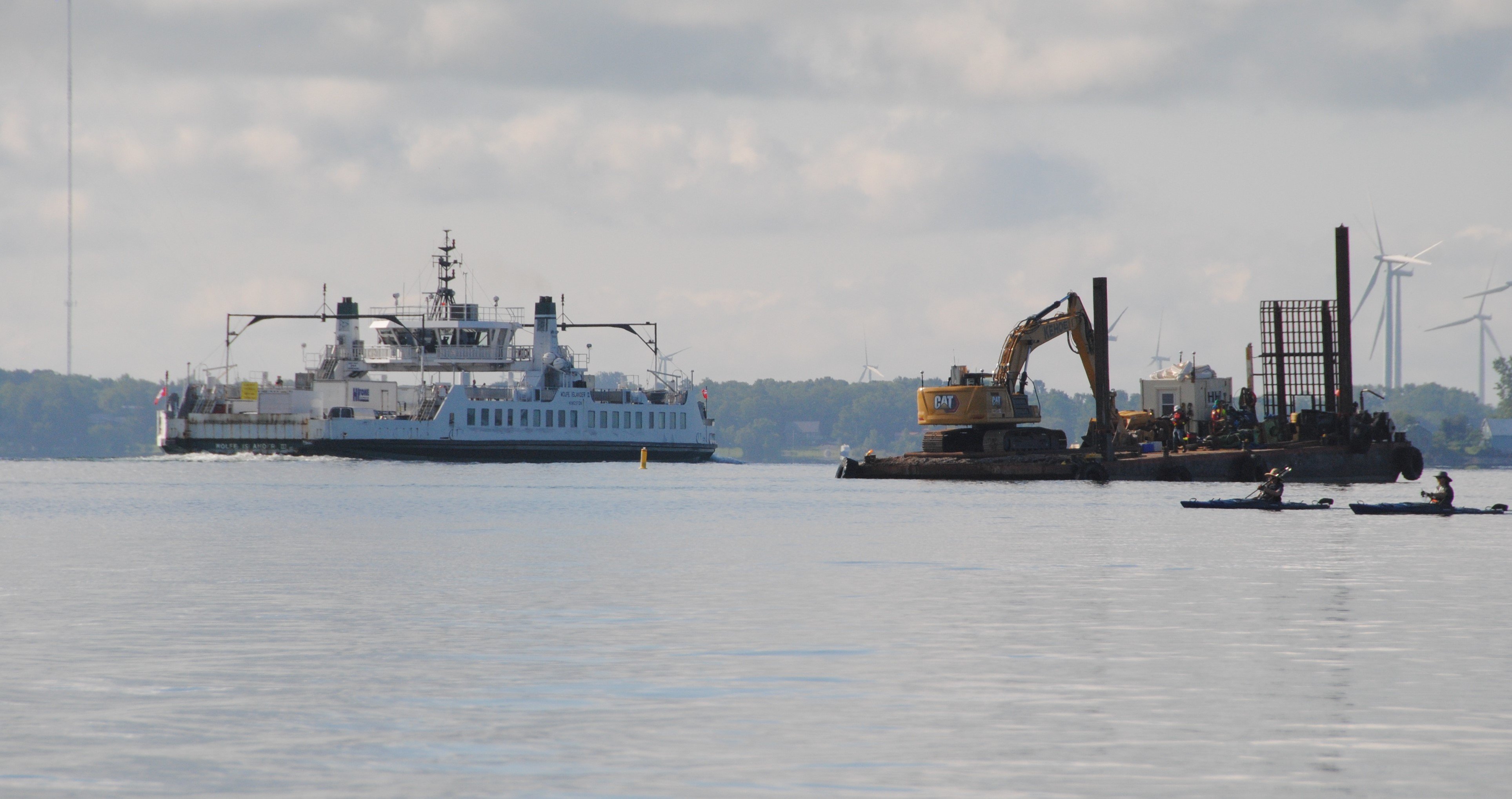 Barges and Equipment for Excavating Sediment